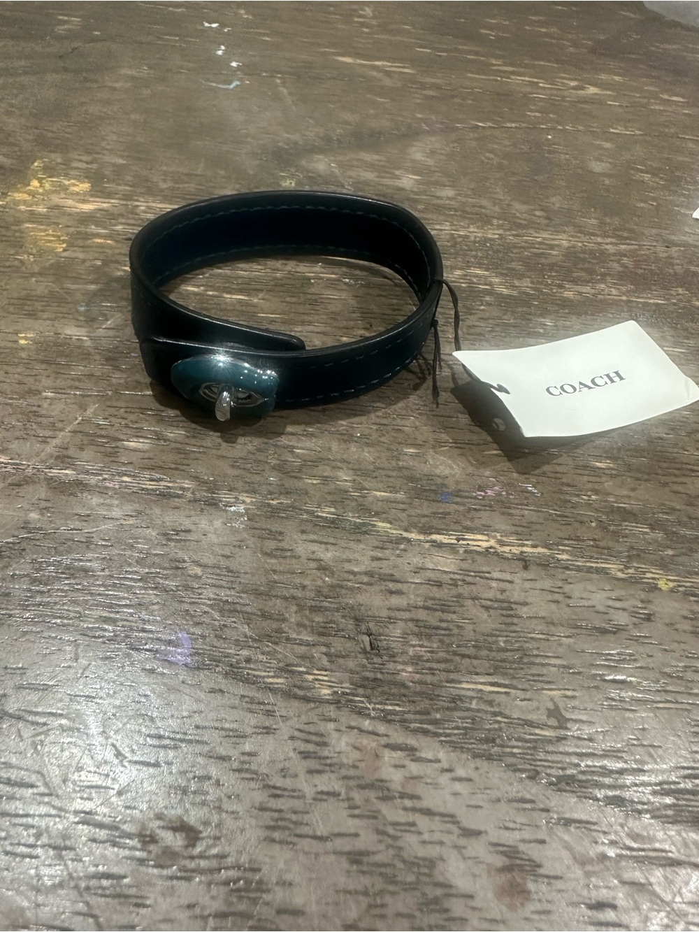 COACH 
Signature Turnlock Leather Bracelet - new 
Color navy blue